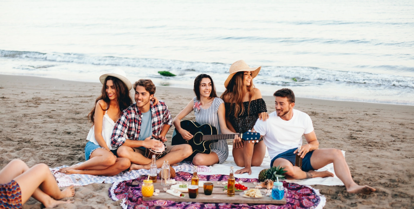 friends doing beach party